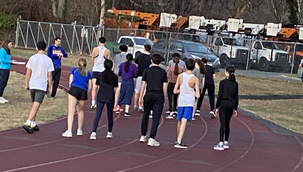 Winter track runners get in position in preperation for their time trials.